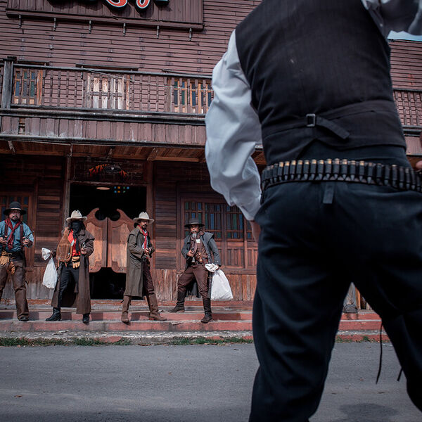 cowboys-group-showing-action-s