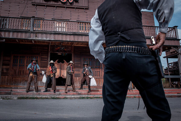 cowboys-group-showing-action-s