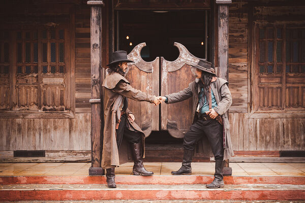 cowboy-posing-shooting-rifle-b