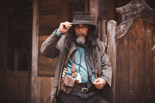 cowboy-posing-shooting-rifle-b