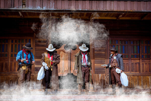 cowboys-group-showing-action-s