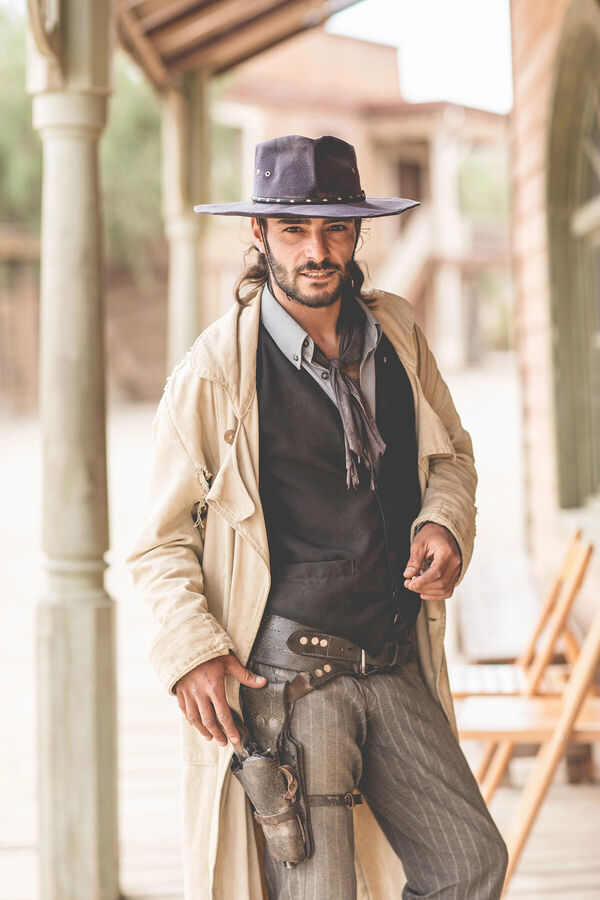 portrait-of-cowboy-on-porch-on