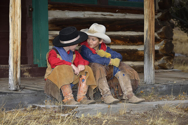 usa-wyoming-two-young-cowboys-